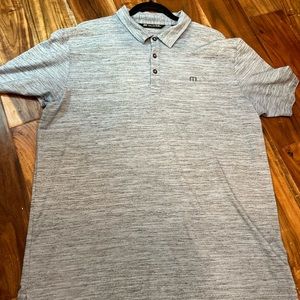 Travis Mathew light blue golf polo